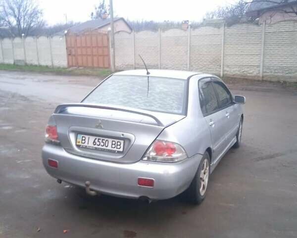 Серый Мицубиси Лансер, объемом двигателя 2 л и пробегом 300 тыс. км за 2850 $, фото 7 на Automoto.ua