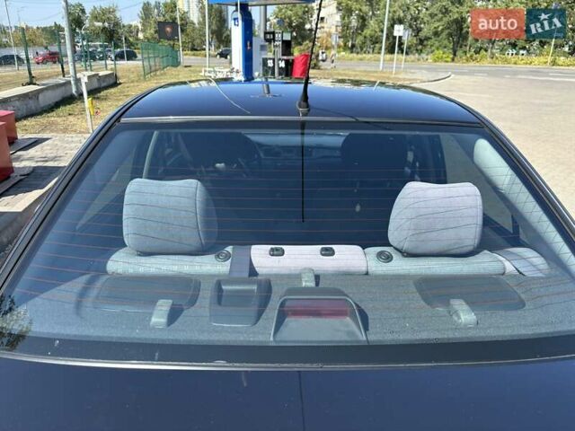 Сірий Міцубісі Lancer, об'ємом двигуна 1.58 л та пробігом 167 тис. км за 5100 $, фото 8 на Automoto.ua