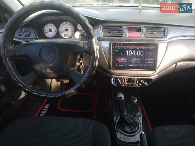 Сірий Міцубісі Lancer, об'ємом двигуна 1.6 л та пробігом 200 тис. км за 4500 $, фото 10 на Automoto.ua