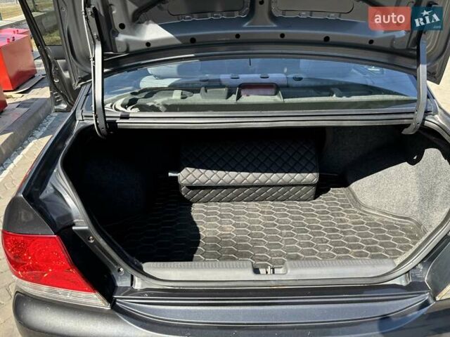 Сірий Міцубісі Lancer, об'ємом двигуна 1.58 л та пробігом 167 тис. км за 5100 $, фото 15 на Automoto.ua