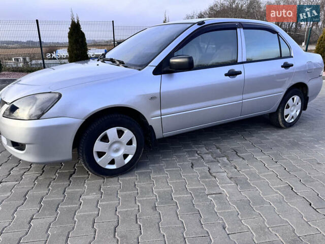 Сірий Міцубісі Lancer, об'ємом двигуна 1.3 л та пробігом 450 тис. км за 2850 $, фото 7 на Automoto.ua