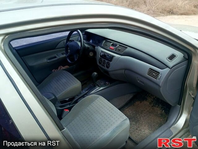 Сірий Міцубісі Lancer, об'ємом двигуна 1.3 л та пробігом 223 тис. км за 4300 $, фото 9 на Automoto.ua
