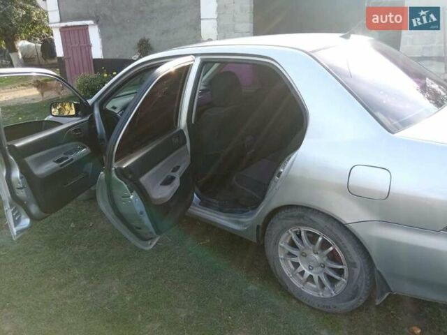 Серый Мицубиси Лансер, объемом двигателя 1.6 л и пробегом 244 тыс. км за 4000 $, фото 3 на Automoto.ua