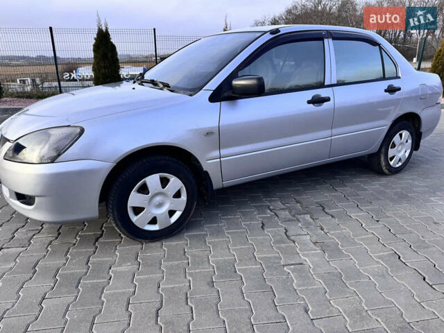 Сірий Міцубісі Lancer, об'ємом двигуна 1.3 л та пробігом 450 тис. км за 2650 $, фото 2 на Automoto.ua