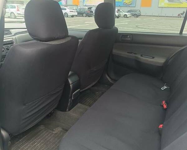 Сірий Міцубісі Lancer, об'ємом двигуна 1.6 л та пробігом 242 тис. км за 4300 $, фото 8 на Automoto.ua
