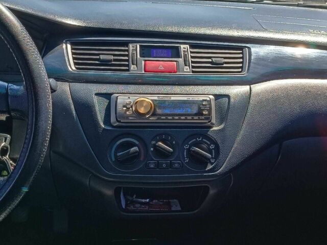 Сірий Міцубісі Lancer, об'ємом двигуна 1.6 л та пробігом 284 тис. км за 4330 $, фото 16 на Automoto.ua