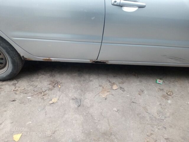 Серый Мицубиси Лансер, объемом двигателя 1.6 л и пробегом 320 тыс. км за 2851 $, фото 5 на Automoto.ua