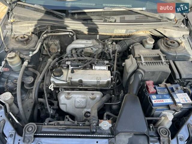Сірий Міцубісі Lancer, об'ємом двигуна 1.58 л та пробігом 262 тис. км за 3900 $, фото 9 на Automoto.ua