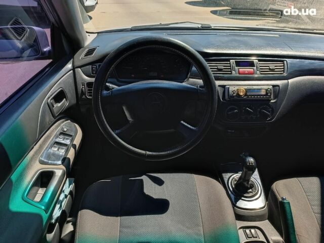 Мицубиси Лансер 2004 в Харькове на Automoto.ua Серый Мицубиси Лансер, объемом двигателя 1.6 л и пробегом 284 тыс. км за 4990 $, фото 15 на Automoto.ua