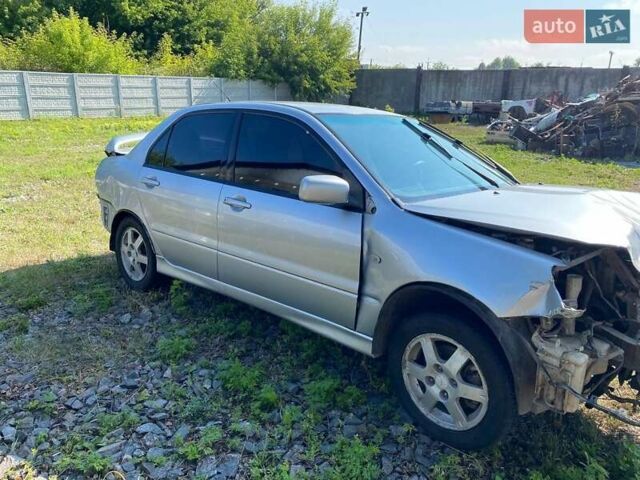 Мицубиси Лансер 2004 в Черкассах на Automoto.ua Серый Мицубиси Лансер, объемом двигателя 1.6 л и пробегом 290 тыс. км за 1600 $, фото 7 на Automoto.ua