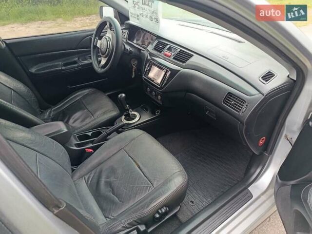 Сірий Міцубісі Lancer, об'ємом двигуна 2 л та пробігом 240 тис. км за 4000 $, фото 10 на Automoto.ua