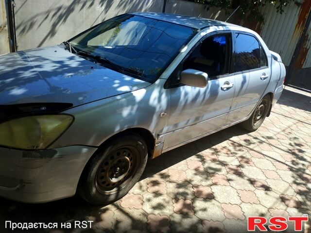 Сірий Міцубісі Lancer, об'ємом двигуна 1.6 л та пробігом 308 тис. км за 3500 $, фото 10 на Automoto.ua