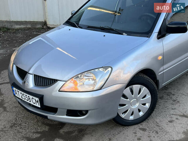 Серый Мицубиси Лансер, объемом двигателя 1.6 л и пробегом 320 тыс. км за 3650 $, фото 15 на Automoto.ua