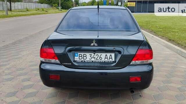 Сірий Міцубісі Lancer, об'ємом двигуна 1.6 л та пробігом 211 тис. км за 3800 $, фото 5 на Automoto.ua