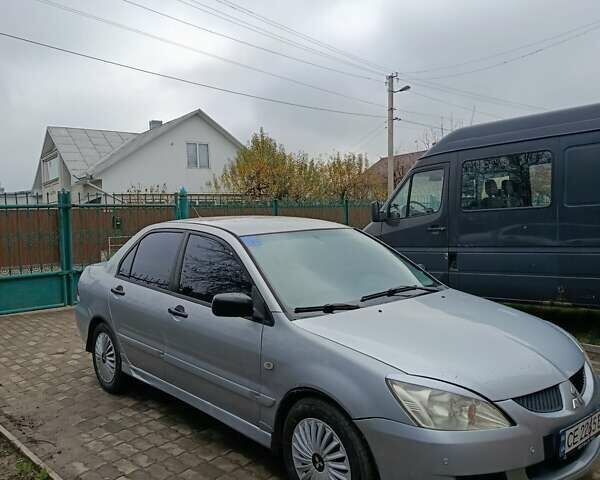 Сірий Міцубісі Lancer, об'ємом двигуна 1.58 л та пробігом 439 тис. км за 2500 $, фото 1 на Automoto.ua