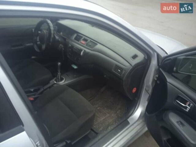 Серый Мицубиси Лансер, объемом двигателя 2 л и пробегом 300 тыс. км за 2850 $, фото 9 на Automoto.ua