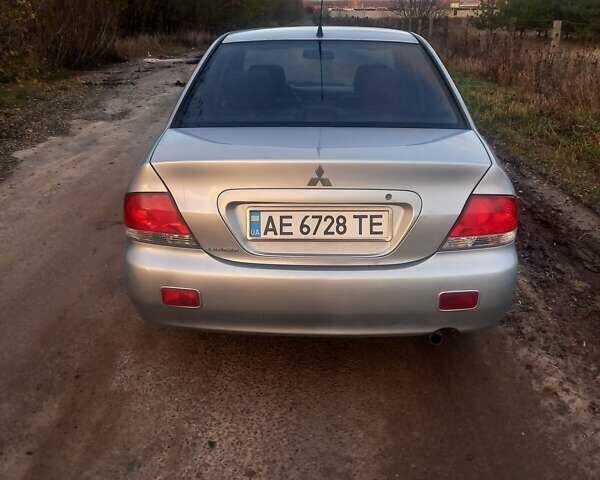 Сірий Міцубісі Lancer, об'ємом двигуна 1.6 л та пробігом 280 тис. км за 3800 $, фото 5 на Automoto.ua