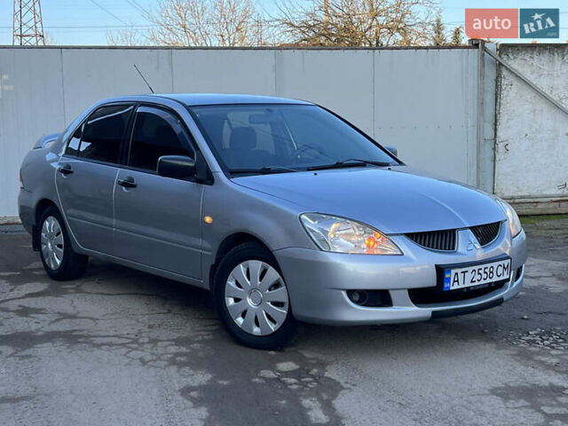 Серый Мицубиси Лансер, объемом двигателя 1.6 л и пробегом 320 тыс. км за 3650 $, фото 6 на Automoto.ua