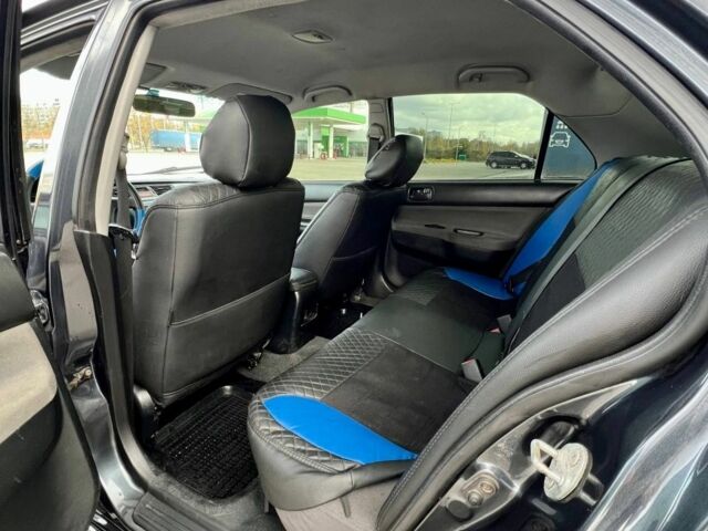 Серый Мицубиси Лансер, объемом двигателя 1.6 л и пробегом 490 тыс. км за 1799 $, фото 12 на Automoto.ua