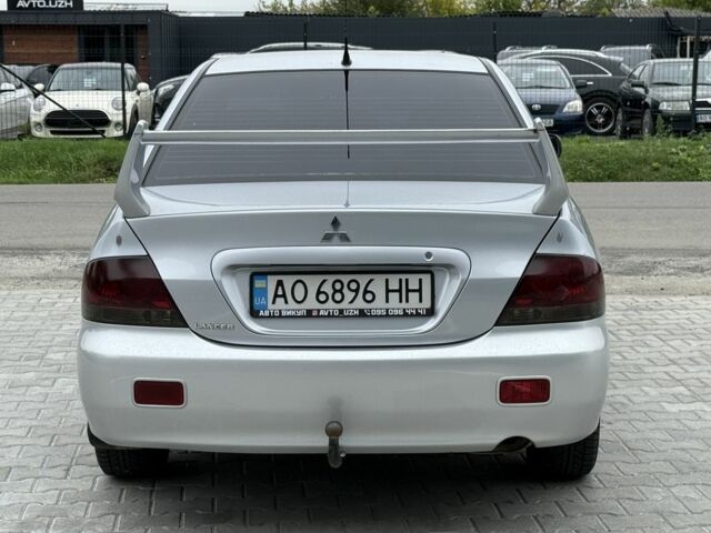 Серый Мицубиси Лансер, объемом двигателя 1.6 л и пробегом 360 тыс. км за 2400 $, фото 2 на Automoto.ua