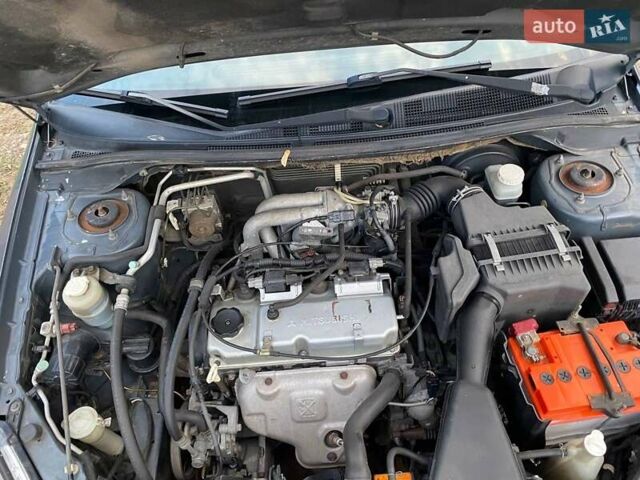 Сірий Міцубісі Lancer, об'ємом двигуна 1.58 л та пробігом 307 тис. км за 3800 $, фото 6 на Automoto.ua