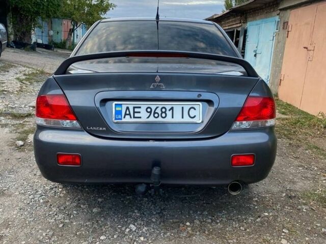 Сірий Міцубісі Lancer, об'ємом двигуна 1.6 л та пробігом 307 тис. км за 3700 $, фото 3 на Automoto.ua