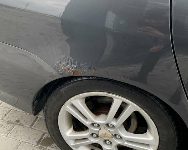 Сірий Міцубісі Lancer, об'ємом двигуна 2 л та пробігом 297 тис. км за 2900 $, фото 18 на Automoto.ua