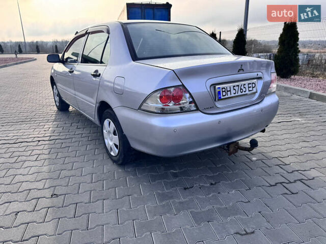 Сірий Міцубісі Lancer, об'ємом двигуна 1.3 л та пробігом 450 тис. км за 2850 $, фото 3 на Automoto.ua
