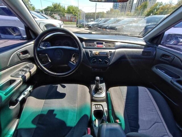 Сірий Міцубісі Lancer, об'ємом двигуна 1.6 л та пробігом 284 тис. км за 4330 $, фото 14 на Automoto.ua