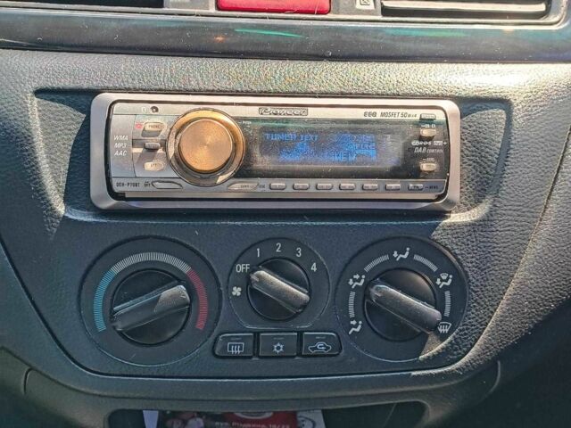 Сірий Міцубісі Lancer, об'ємом двигуна 1.6 л та пробігом 284 тис. км за 4330 $, фото 23 на Automoto.ua