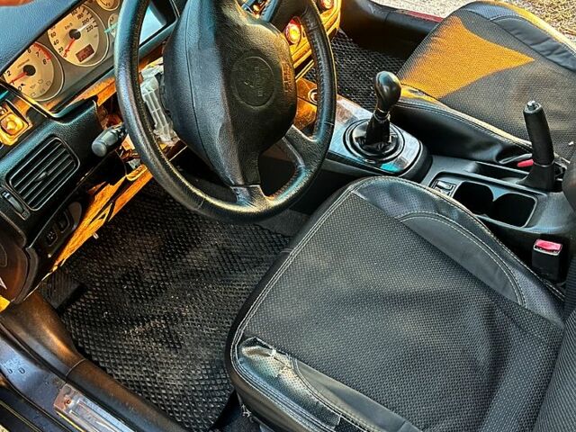 Серый Мицубиси Лансер, объемом двигателя 1.6 л и пробегом 275 тыс. км за 3000 $, фото 6 на Automoto.ua