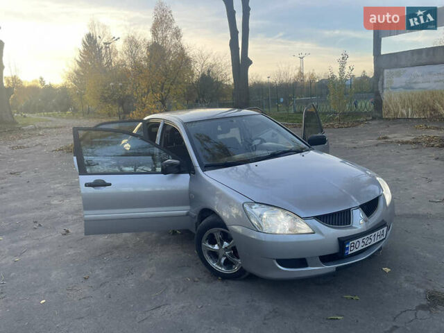 Сірий Міцубісі Lancer, об'ємом двигуна 1.58 л та пробігом 271 тис. км за 3000 $, фото 11 на Automoto.ua