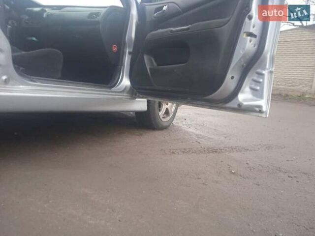 Серый Мицубиси Лансер, объемом двигателя 2 л и пробегом 300 тыс. км за 2850 $, фото 11 на Automoto.ua