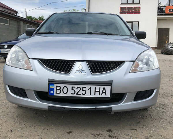 Серый Мицубиси Лансер, объемом двигателя 1.58 л и пробегом 265 тыс. км за 3300 $, фото 1 на Automoto.ua