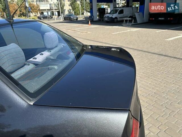 Сірий Міцубісі Lancer, об'ємом двигуна 1.58 л та пробігом 167 тис. км за 5100 $, фото 14 на Automoto.ua