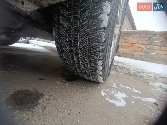 Серый Мицубиси Лансер, объемом двигателя 1.58 л и пробегом 300 тыс. км за 2550 $, фото 2 на Automoto.ua