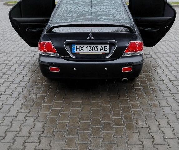 Сірий Міцубісі Lancer, об'ємом двигуна 1.6 л та пробігом 177 тис. км за 4500 $, фото 23 на Automoto.ua