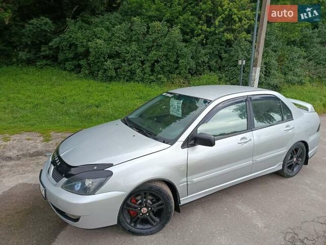 Сірий Міцубісі Lancer, об'ємом двигуна 2 л та пробігом 240 тис. км за 4000 $, фото 3 на Automoto.ua