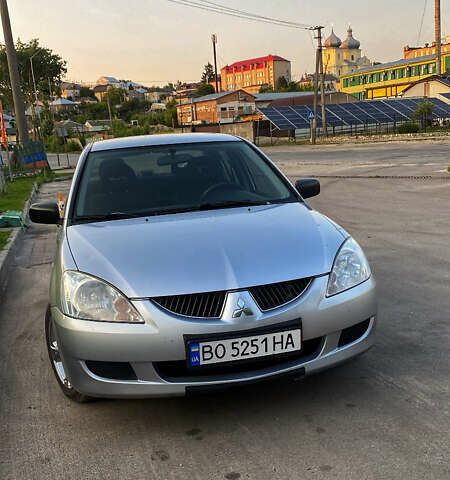 Сірий Міцубісі Lancer, об'ємом двигуна 1.58 л та пробігом 268 тис. км за 3799 $, фото 9 на Automoto.ua