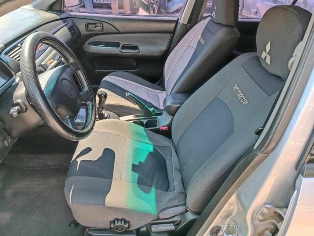Сірий Міцубісі Lancer, об'ємом двигуна 1.6 л та пробігом 284 тис. км за 4330 $, фото 19 на Automoto.ua