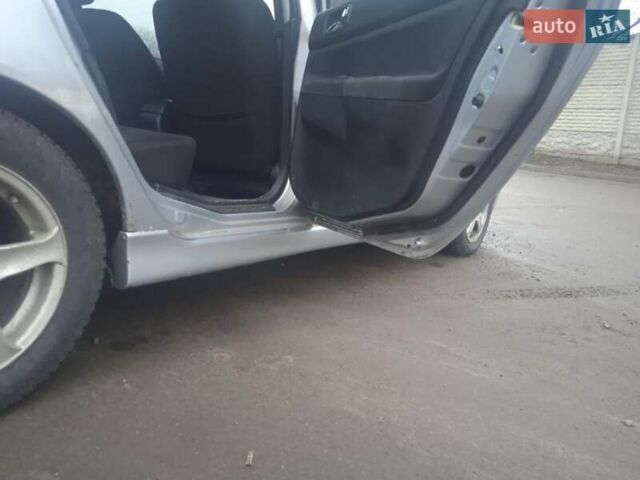 Серый Мицубиси Лансер, объемом двигателя 2 л и пробегом 300 тыс. км за 2850 $, фото 12 на Automoto.ua