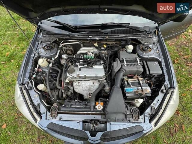 Серый Мицубиси Лансер, объемом двигателя 1.58 л и пробегом 313 тыс. км за 4650 $, фото 6 на Automoto.ua