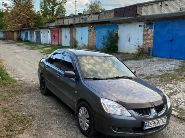 Сірий Міцубісі Lancer, об'ємом двигуна 1.6 л та пробігом 307 тис. км за 3700 $, фото 1 на Automoto.ua