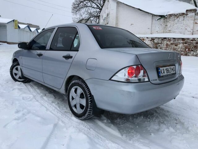 Сірий Міцубісі Lancer, об'ємом двигуна 0.13 л та пробігом 190 тис. км за 4250 $, фото 3 на Automoto.ua