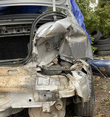 Сірий Міцубісі Lancer, об'ємом двигуна 1.58 л та пробігом 270 тис. км за 1999 $, фото 16 на Automoto.ua