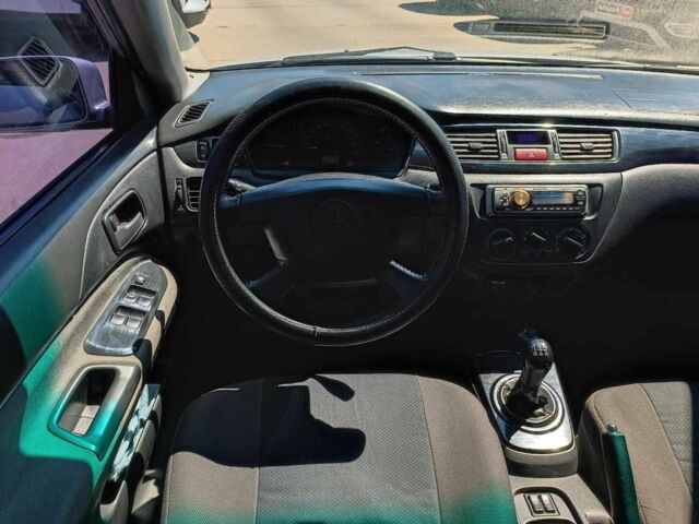 Сірий Міцубісі Lancer, об'ємом двигуна 1.6 л та пробігом 284 тис. км за 4330 $, фото 15 на Automoto.ua