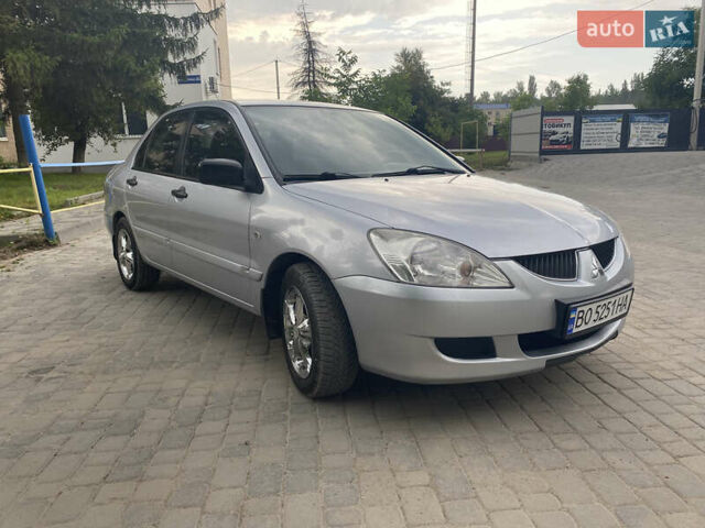 Сірий Міцубісі Lancer, об'ємом двигуна 1.58 л та пробігом 268 тис. км за 3799 $, фото 2 на Automoto.ua