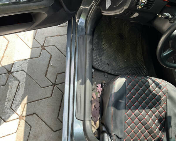 Сірий Міцубісі Lancer, об'ємом двигуна 1.58 л та пробігом 300 тис. км за 3800 $, фото 15 на Automoto.ua