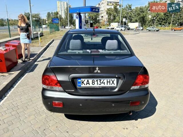 Сірий Міцубісі Lancer, об'ємом двигуна 1.58 л та пробігом 167 тис. км за 5100 $, фото 2 на Automoto.ua