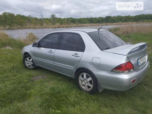 Сірий Міцубісі Lancer, об'ємом двигуна 1.6 л та пробігом 200 тис. км за 4500 $, фото 16 на Automoto.ua